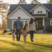 Rear View, Young family looking at their new home standing, real estate purchase, Generative AI